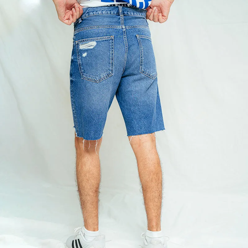 Ripped denim Bermuda shorts